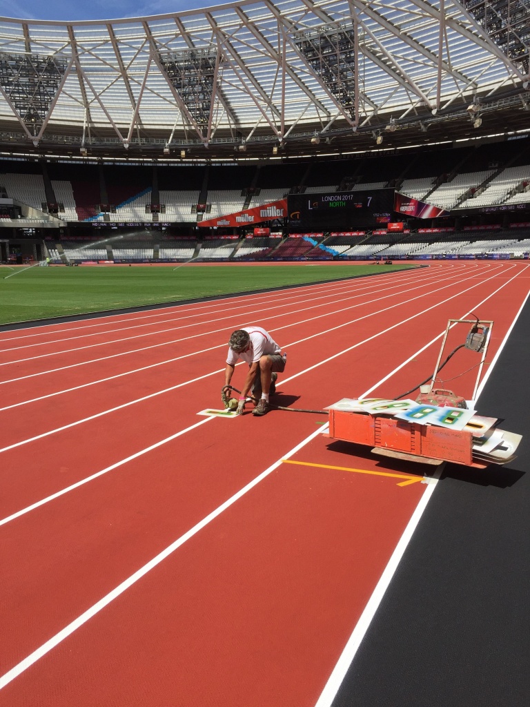 Marc spray painting hurdles 